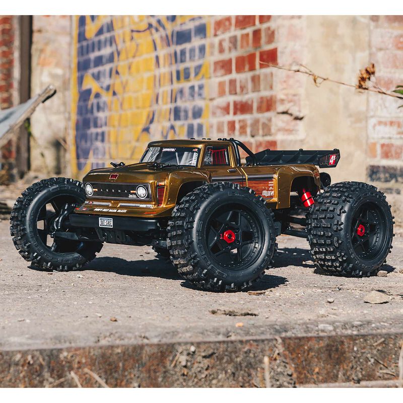 1/10 OUTCAST 4S 4X4 RTR Brushless Stunt Truck, Bronze